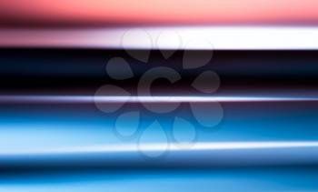 Horizontal pink and blue motion blur background