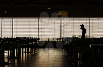 Airport cafe man silhouette