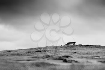 Lone bench on the hill landscape backdrop hd