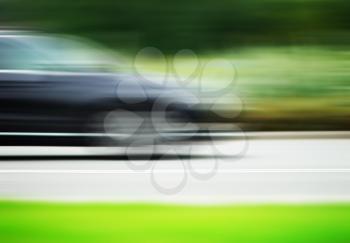 Horizontal car on road motion blur background hd