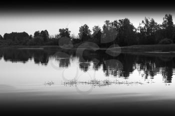 Horizontal black and white river landscape with reflections hd