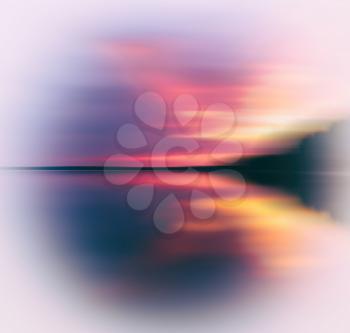 Evening sunset on smooth lake abstraction