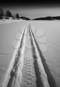 Vertical black and white road over the frozen river background hd