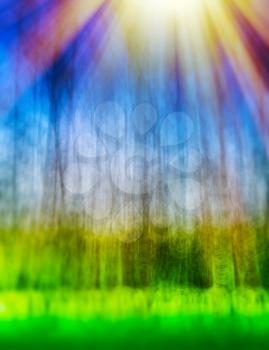 Vertical bokeh blurred abstract landscape with light leak background