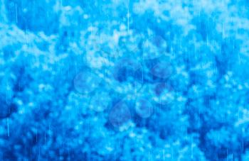 Raining weather blue bokeh background