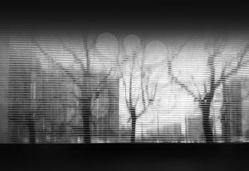 Black and white city through plastic glass background