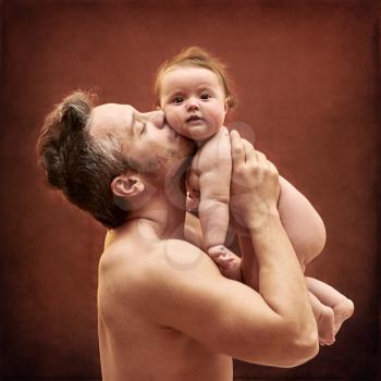 Young father with baby girl idyllic stock photo