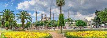 Istambul, Turkey – 07.12.2019. The Sultan Ahmad Maydan with the Blue Mosque in background on a cloudy summer day, Istanbul, Turkey
