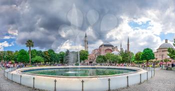 Istambul, Turkey – 07.12.2019. Hagia Sophia museum with Fountain in Sultan Ahmed Park, Istanbul, Turkey, on a cloudy summer day