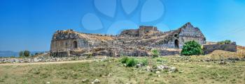 The ruins of an Ancient Theatre in the greek city of Miletus in Turkey on a sunny summer day