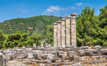Ruins of the Temple of Athena Polias in the ancient city of Priene, Turkey, on a sunny summer day