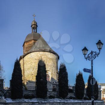 Kamianets-Podilskyi, Ukraine 01.07.2020. Trinity Church in Kamianets-Podilskyi historical centre on a sunny christmas winter morning