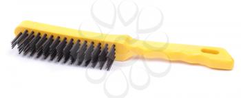 Yellow wire brush for cleaning corrosive metal isolated on white background