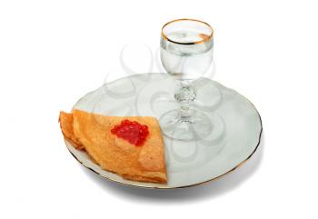 A glass of vodka with pancake and caviar isolated on white background