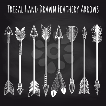 Hand drawn feathery arrows collection on chalkboard background. Vector illustration