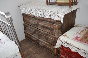 Antique dresser with drawers. Old furniture in the cottage.