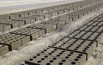Cinder blocks lie on the ground and dried. on cinder block production plant
