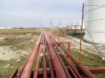 Piping for pumping refined petroleum products. Pipes at the refinery.                           