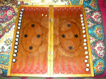 The Backgammon. The wooden backgammon made manually.         