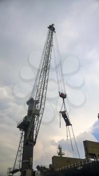 Novorossiysk, Russia - August 11, 2016: Port cranes against the sky. Cargo industrial port