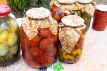 Home canned vegetables. Tomatoes cucumbers and peppers and much more