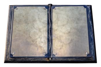 An old metal book. Blank pages of an old book.