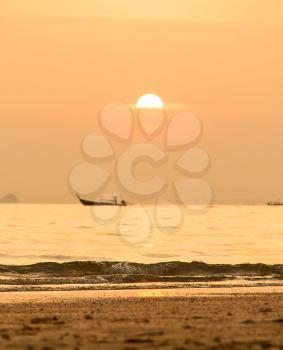 Sunset Beach In Thailand With Sea And Longtail Boat