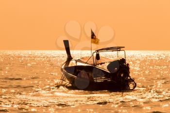 Longtail Boat In Phuket Thailand At Sunset