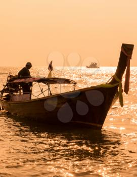 Long Tail Boat In Phuket Thailand During Sunset