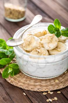 Fresh banana yogurt with oats, delicious dessert for healthy breakfast