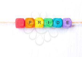 Word pride  rainbow colors on cubes.Concept  LGBT.Rainbow flag.
