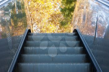 The escalator on the stree,outdoors, move up