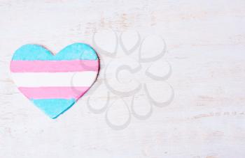 Heart with transgender flag. Blue, pink, white