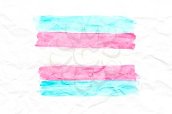 Transgender flag on white crumpled paper. Blue, pink.