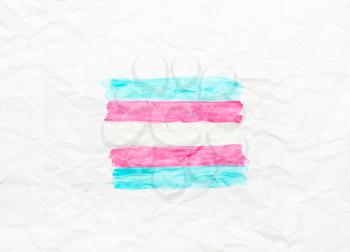 Transgender flag on white crumpled paper. Blue, pink.