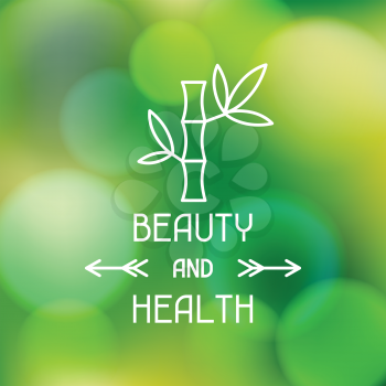 Spa beauty and health label on abstract blurred background.