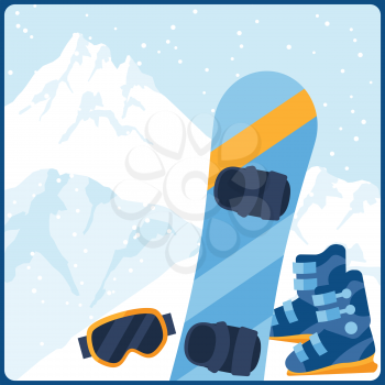 Snowboarding equipment on background of mountain landscape.