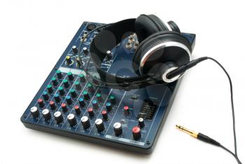 Mixing console and headphones. Element of music design.