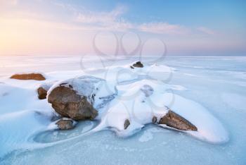 Stone on ice. Winter landscape. 