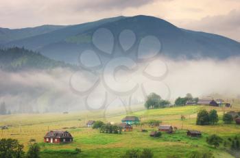 Village in mountain. Nature composition.