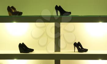 Shelf with shoeses. Element of design.