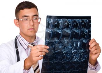 Young male doctor looking at tomography brain, isolated over white
