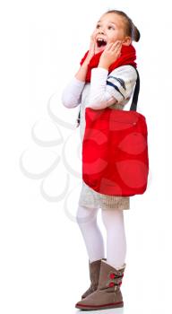 Cute girl with shopping bags, isolated over white
