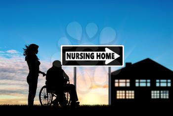 Silhouette of a nurse caring for an elderly man in a wheelchair. Concept of caring for a disabled person and house of aged