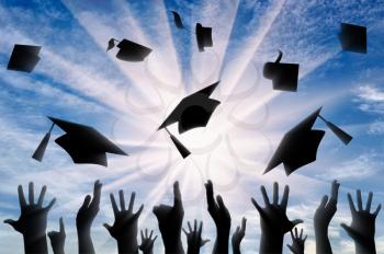 Hands throwing graduate cap in sky in day. concept of education