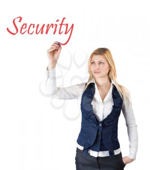 Young woman writes the word safety. Isolated on white background