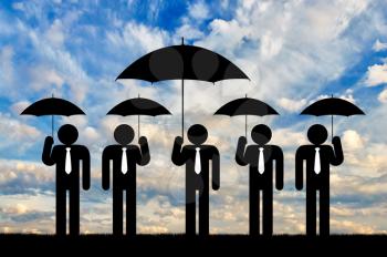 Leader among the crowd concept. Leader among the crowd concept. Man with a large umbrella among ordinary people with standard umbrella
