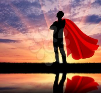 Superman businessman superhero. Silhouette of confident and strong businessman superman and his reflection in water