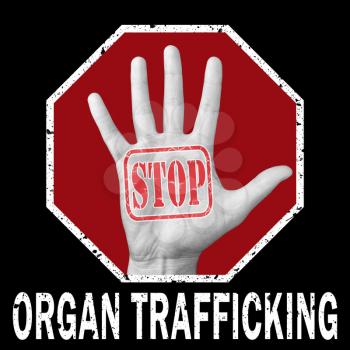 Stop organ trafficking conceptual illustration. Open hand with the text stop organ trafficking. Global social problem