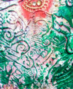 Abstract unfocused background. Green curls and rhinestones.